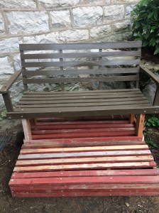unused wooden garden stakes create a place to prop your feet