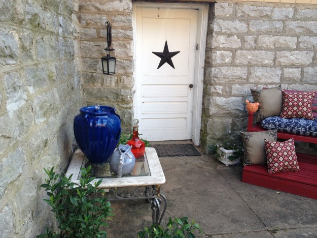 entry way into basement area, now repurposed as a reading & relaxation nook!